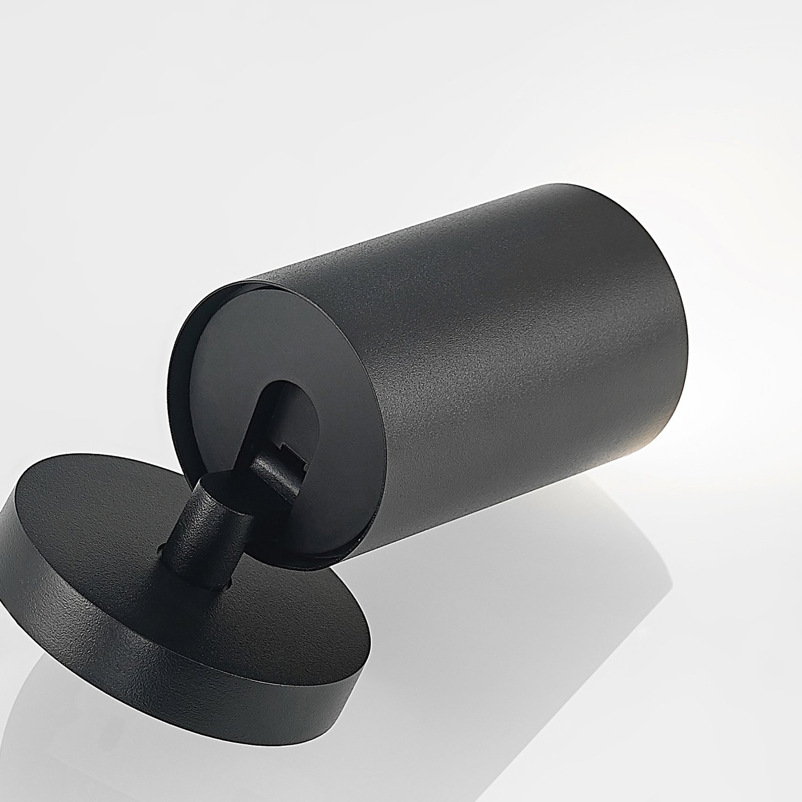 Arcchio Brinja spotlight, black, round, 12 cm high, Ø 6 cm